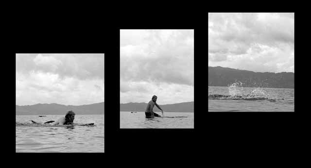 Karl tries his hand at surfing on a lake