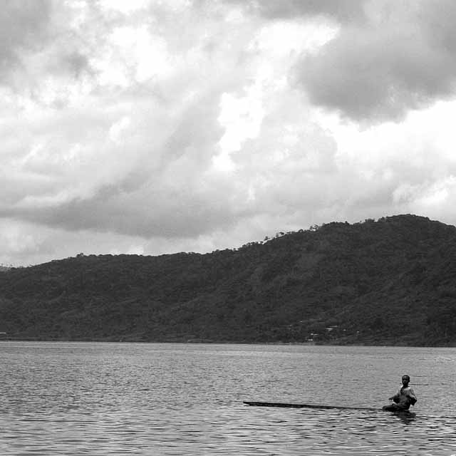 A fisherman on the lake