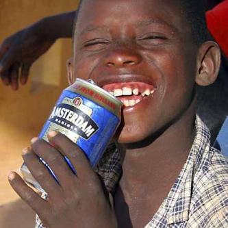 Kid with recycled beer can drink