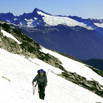 Karl side-hilling with Eldorado Peak in the distance